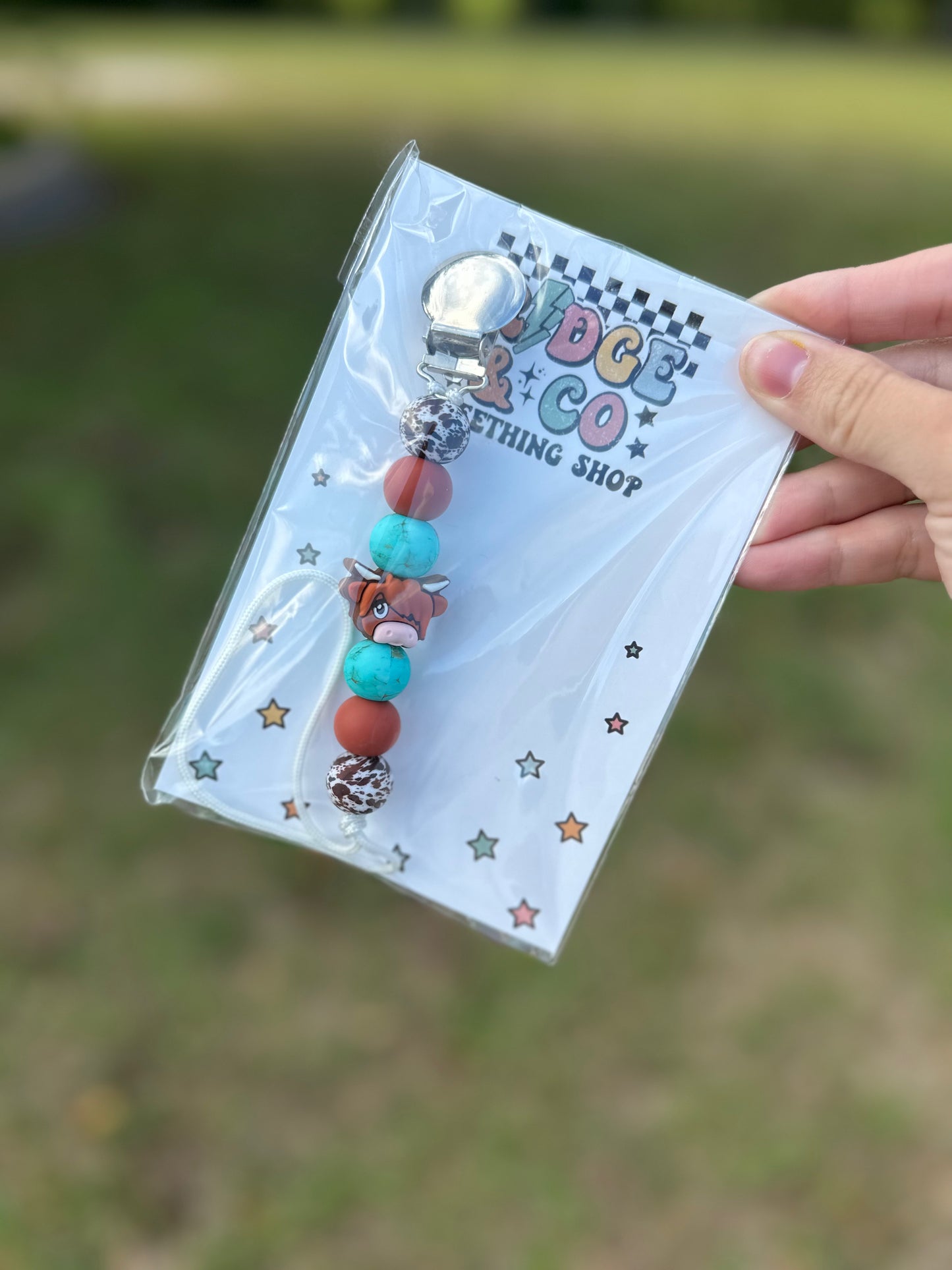 Highland cow paci clip